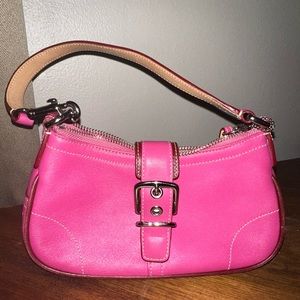 This small coach bag is in excellent condition I only carried it once.